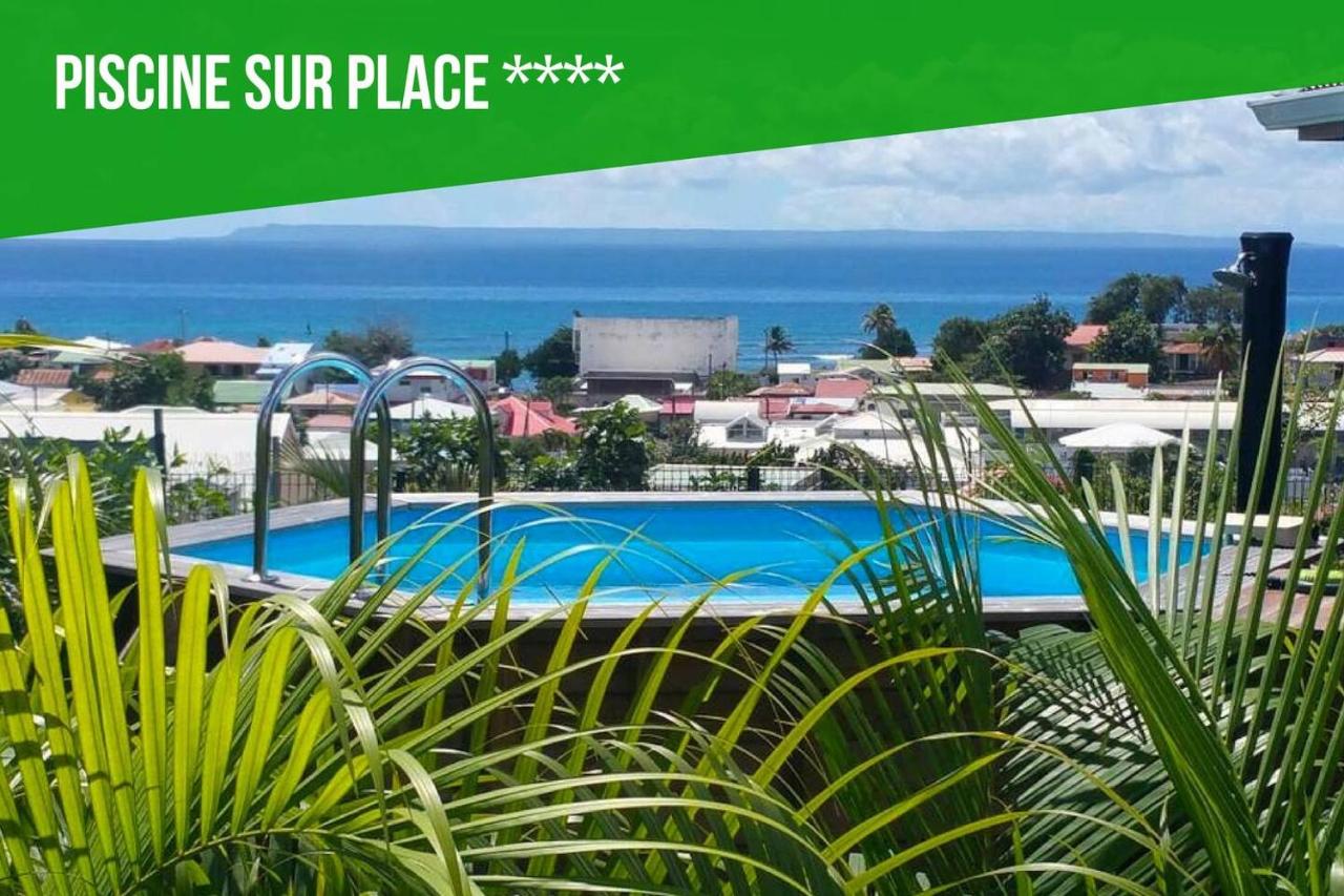 Les îlets du Paradis - Gîtes vue mer à 180° et Piscine - Chambres d’hôtes Saint-François