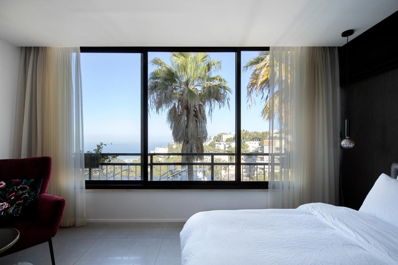 Suite met Kingsize Bed en Uitzicht op Zee