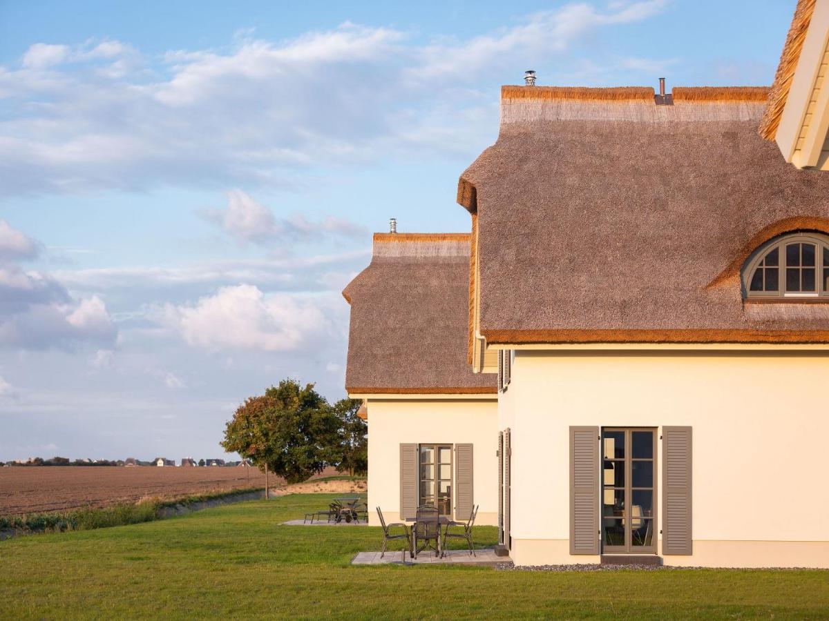 Reetland am Meer - Premium Reetdachvilla mit 3 Schlafzimmern, Sauna und Kamin E08 - Ferienwohnung Dranske