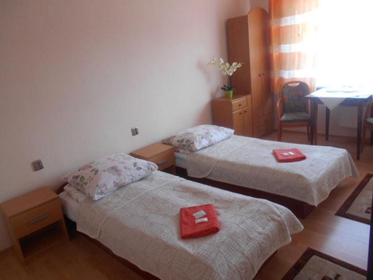 Camera Familiare con Bagno in Comune