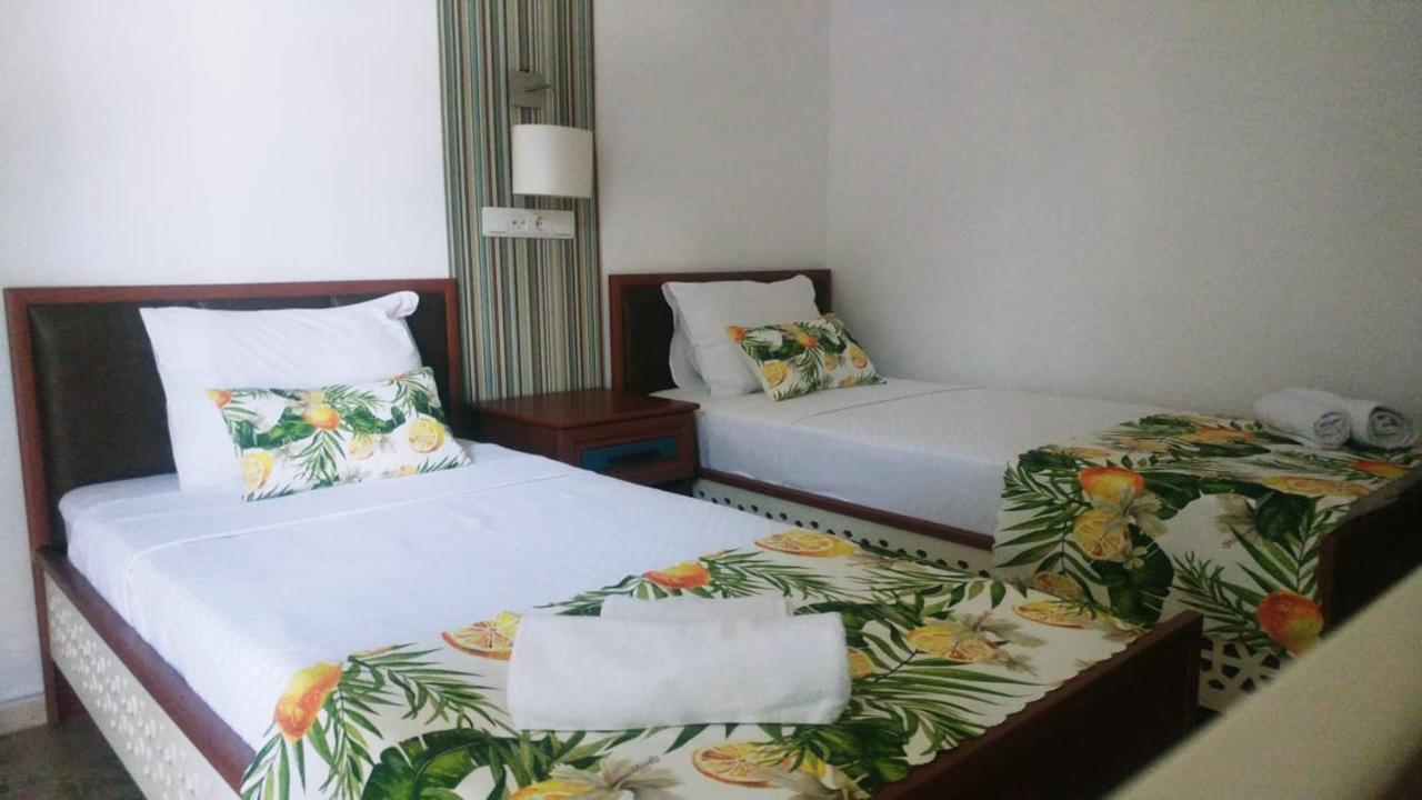 Chambre Lits Jumeaux - Vue sur Piscine