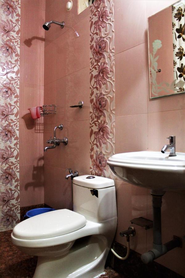 Vierpersoonskamer met Uitzicht op de Tuin.