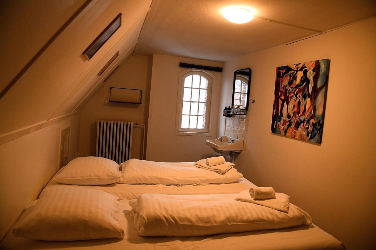 Small Gable Room (Double Bed) on 2nd floor. Shared Bathroom/Toilet