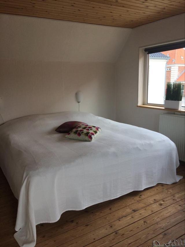 Camera Familiare con Bagno in Comune