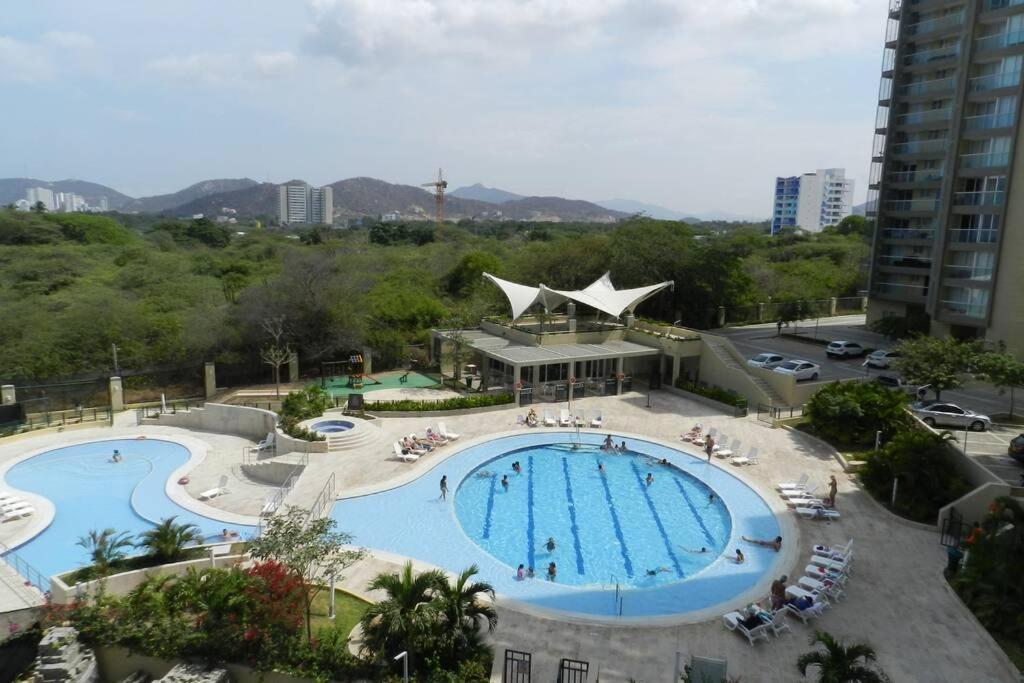 Apartamento Bello Horizonte Zazue - Chambres d’hôtes