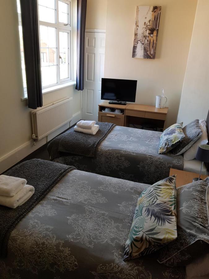 Tweepersoonskamer met 2 Aparte Bedden