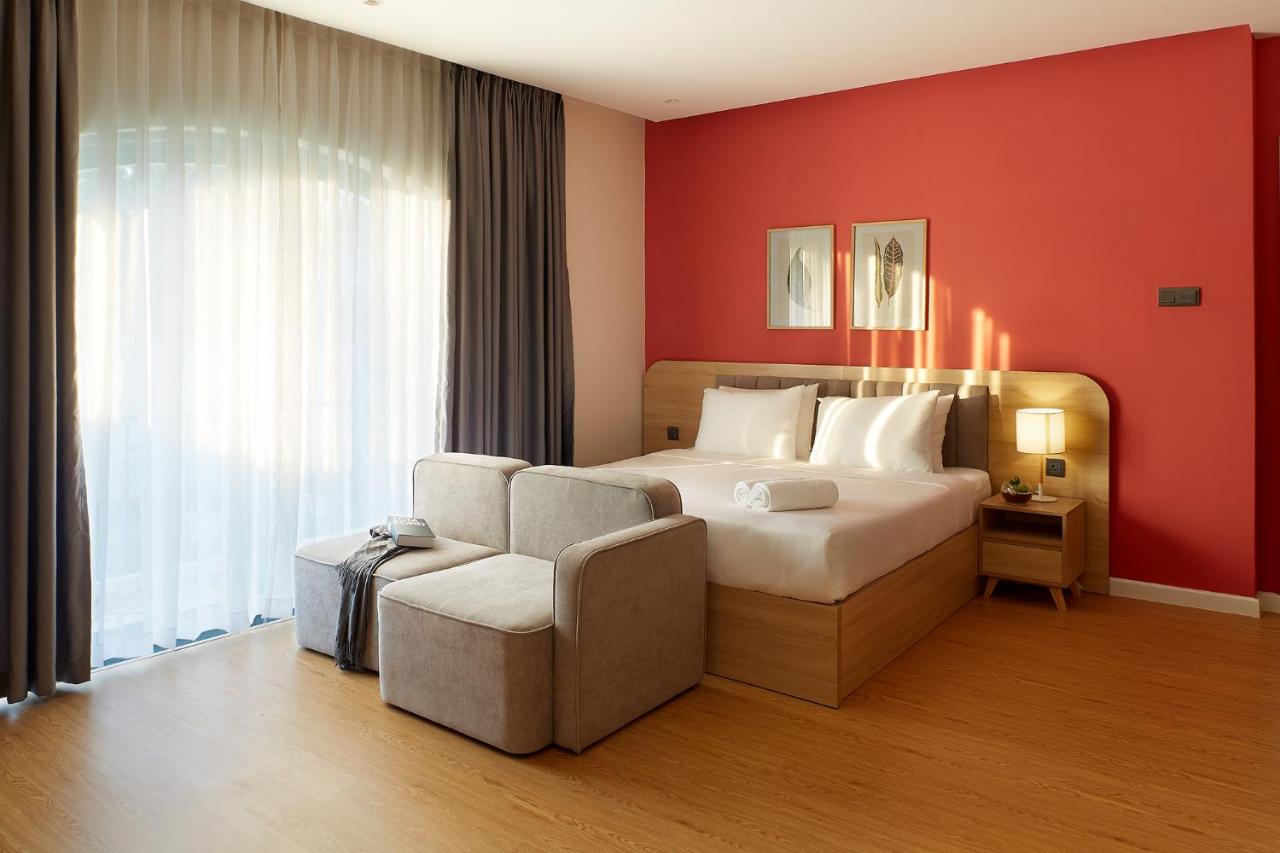 Suite mit Kingsize-Bett und Balkon