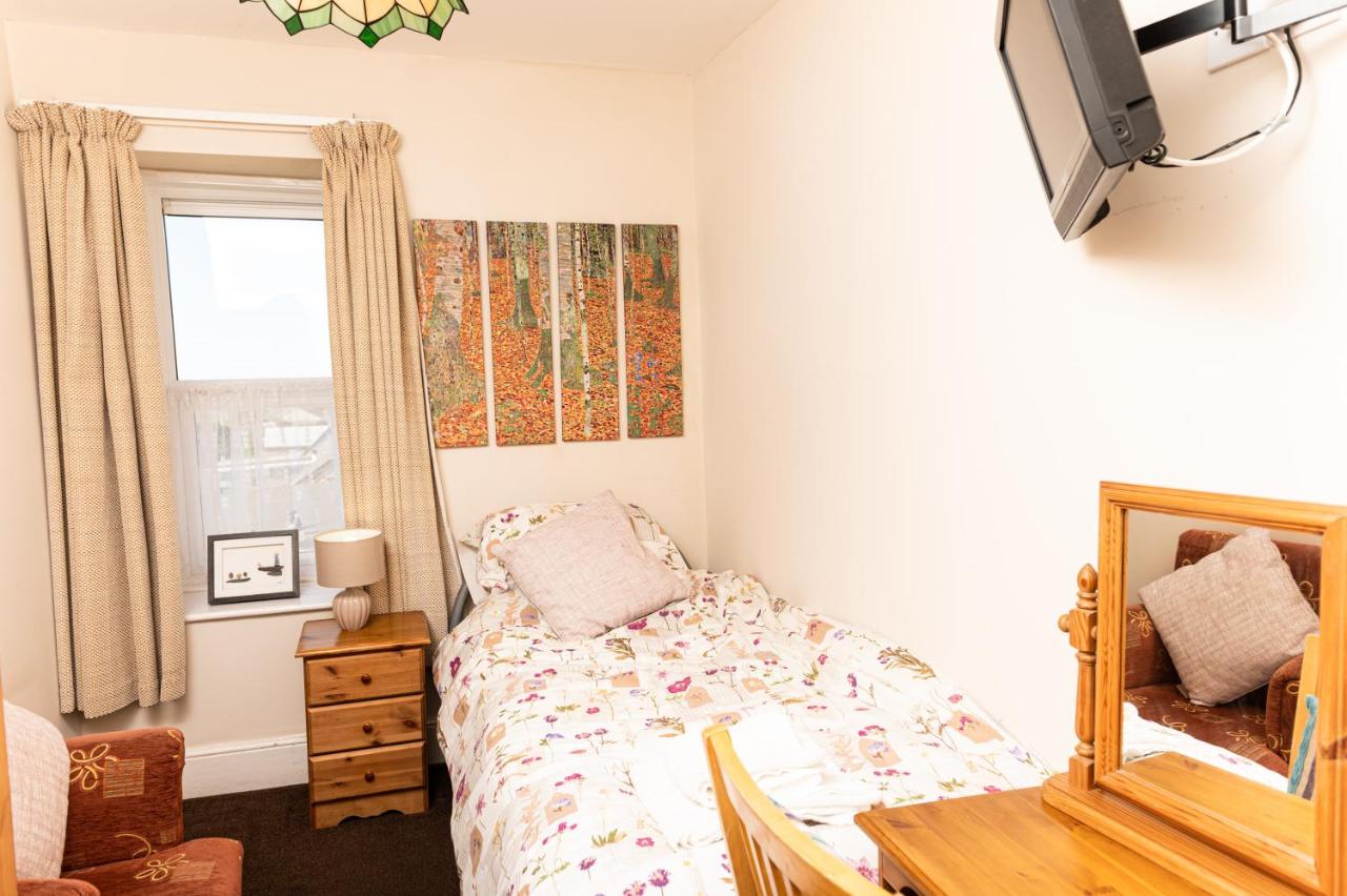 Single Room with Shared Shower and Toilet