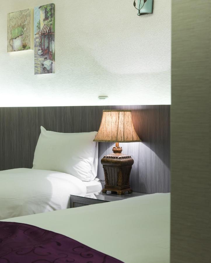 Tweepersoonskamer met 2 Aparte Bedden