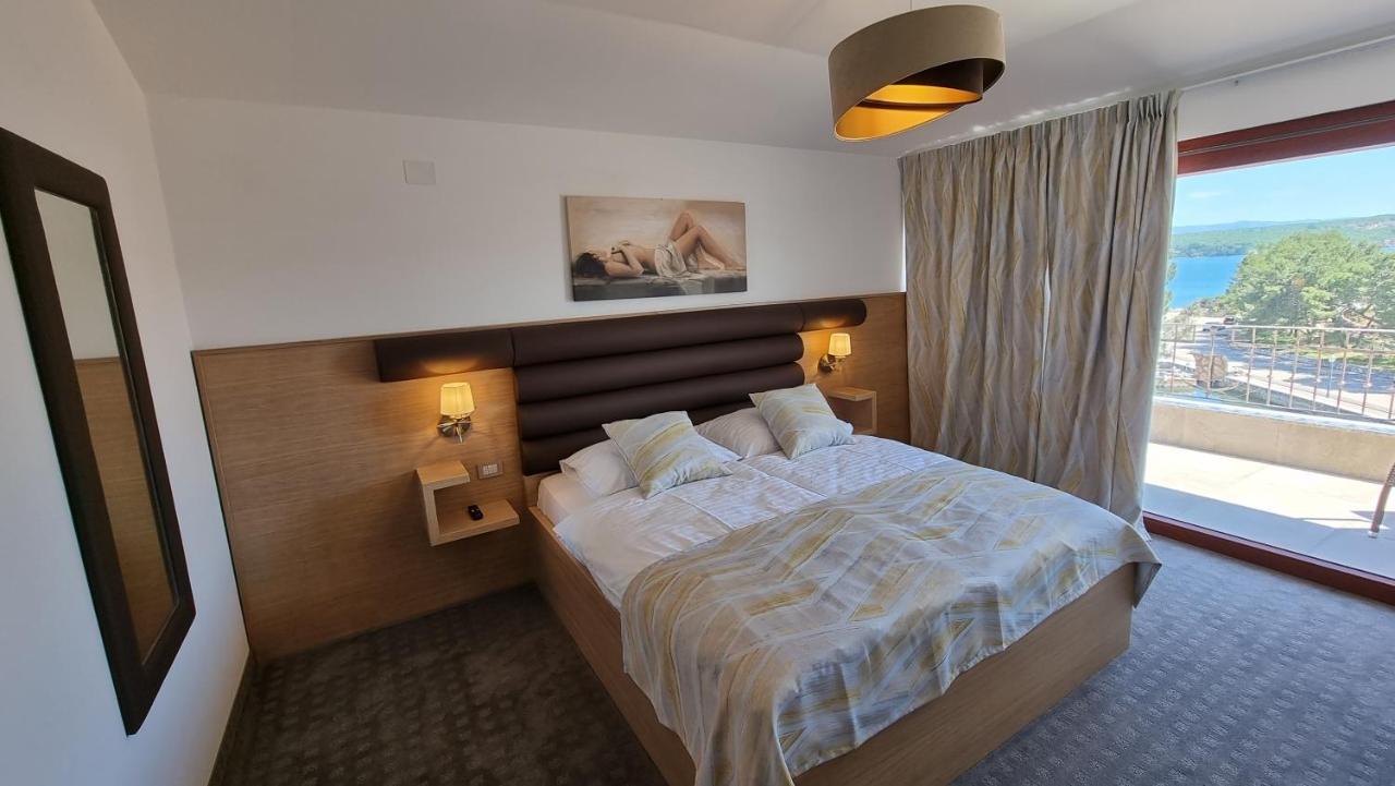 Deluxe Suite with Balcony and Sea View