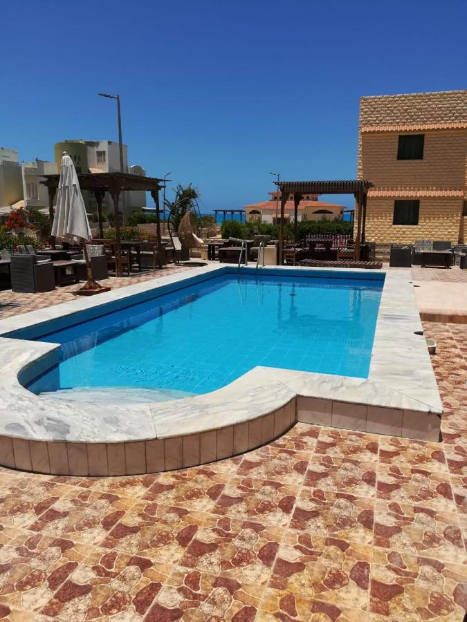 studio 1 or 2 1bed room sea view by the pool green beach v114 - B&B El Alamein