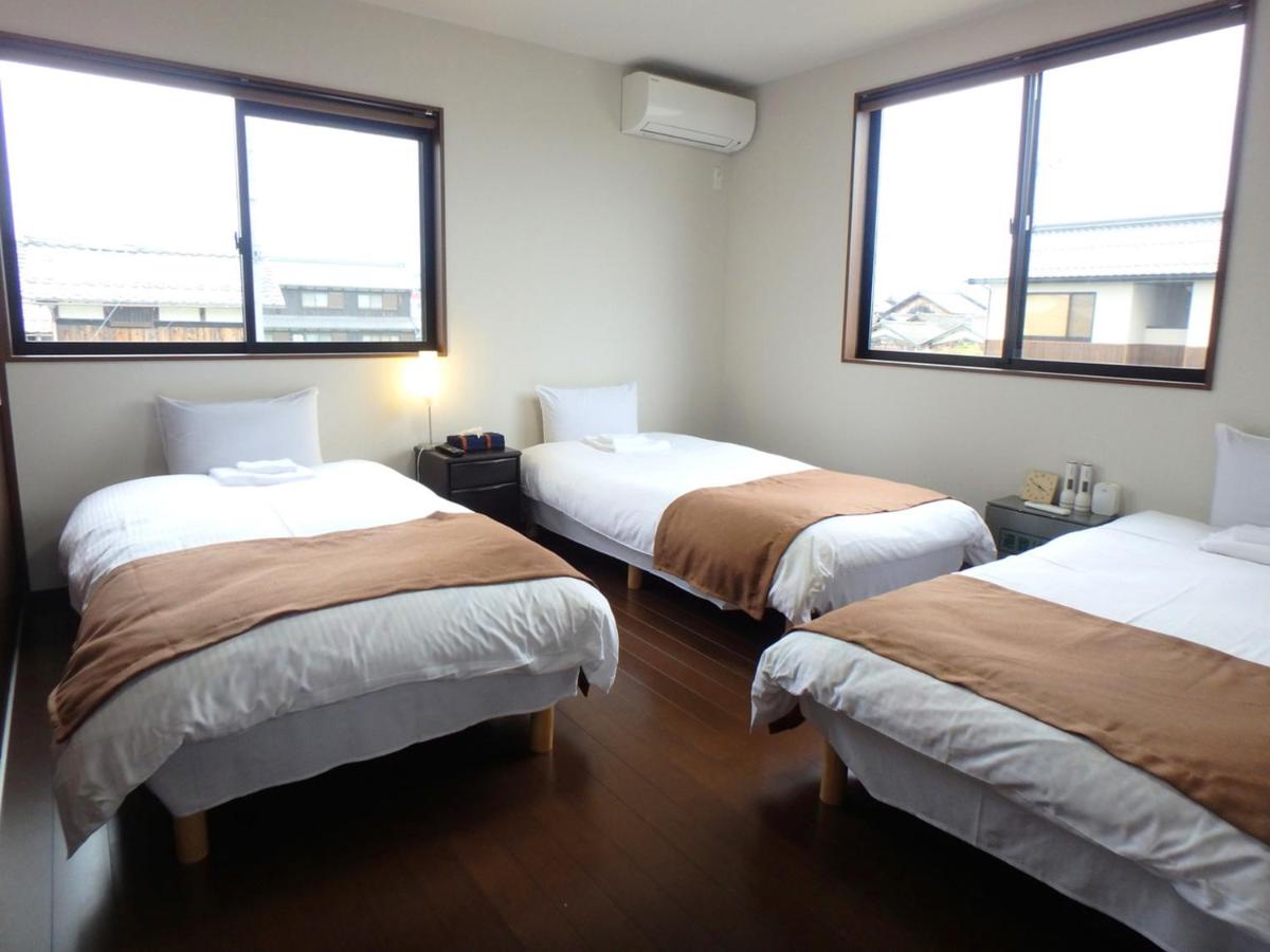 Camera Tripla con Bagno in Comune