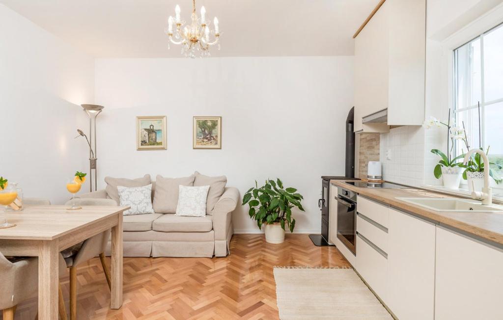 Sunset Apartment with Sea View - Chambres d’hôtes Povljana