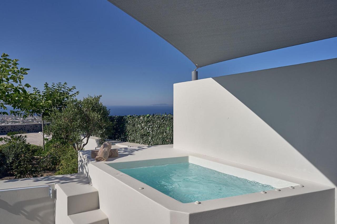Suite Junior con bañera de hidromasaje y vistas parciales al mar - Planta inferior al patio