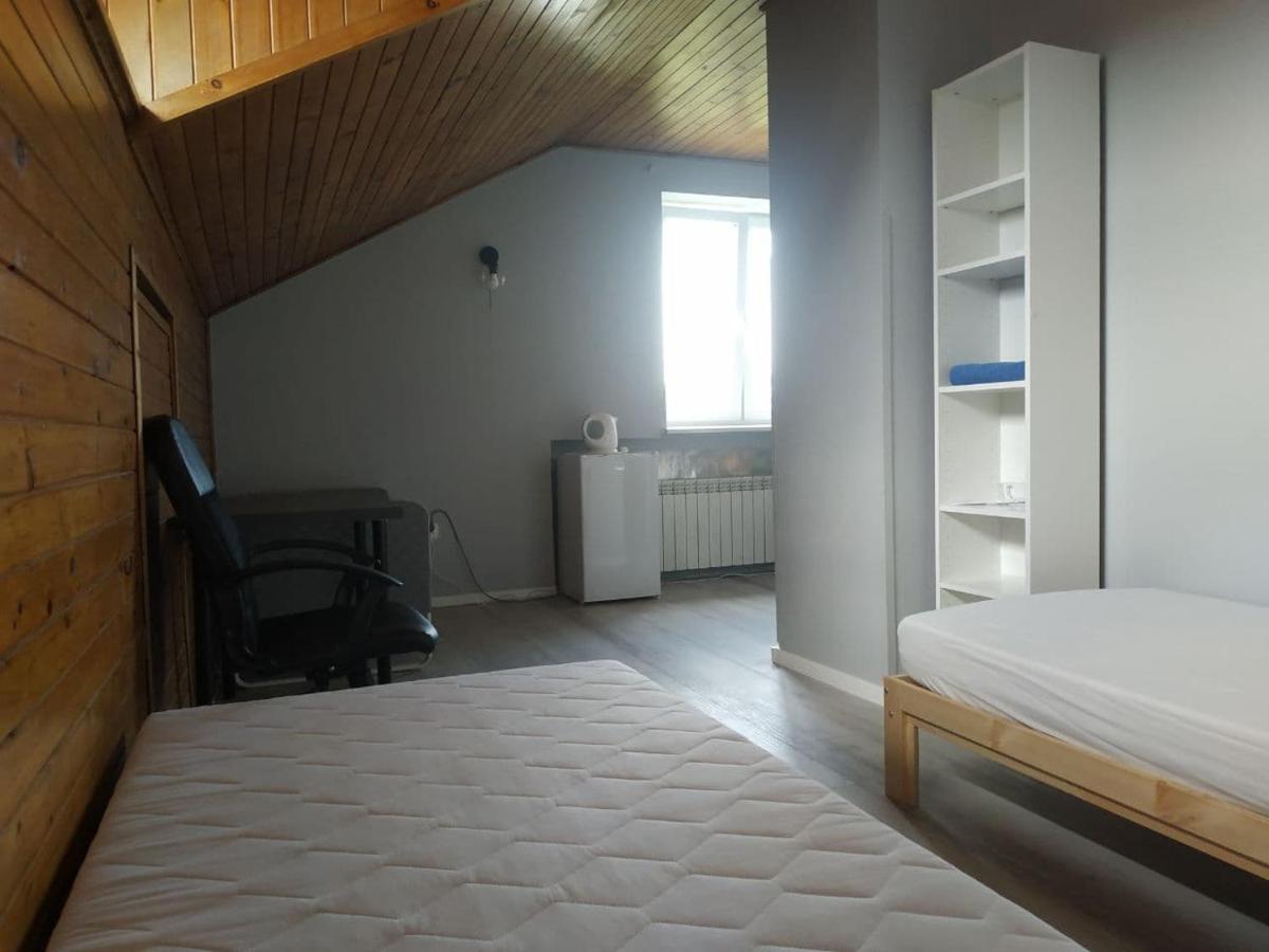 Camera Standard Doppia con Letti Singoli con Bagno in Comune