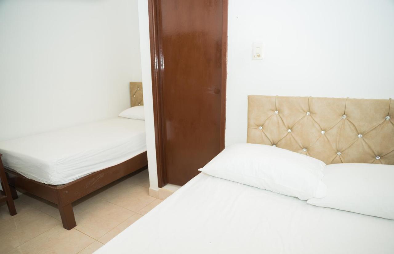 Cama individual en habitación compartida