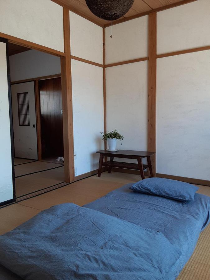 Single Room with Shared Shower and Toilet