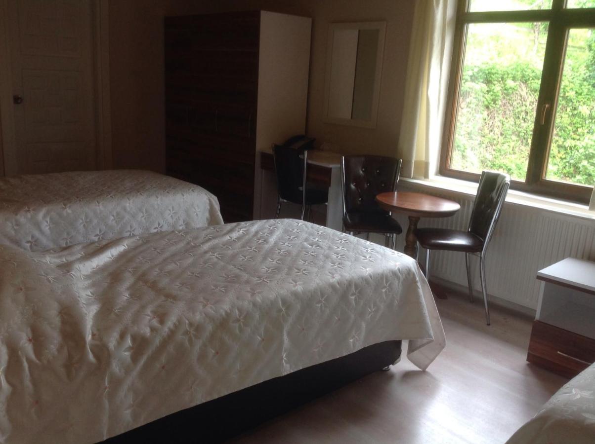 Chambre Quadruple avec Salle de Bains Privative