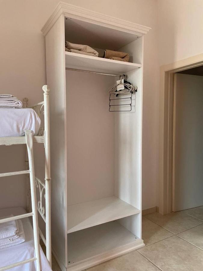 Camera Quadrupla con Vista Giardino 