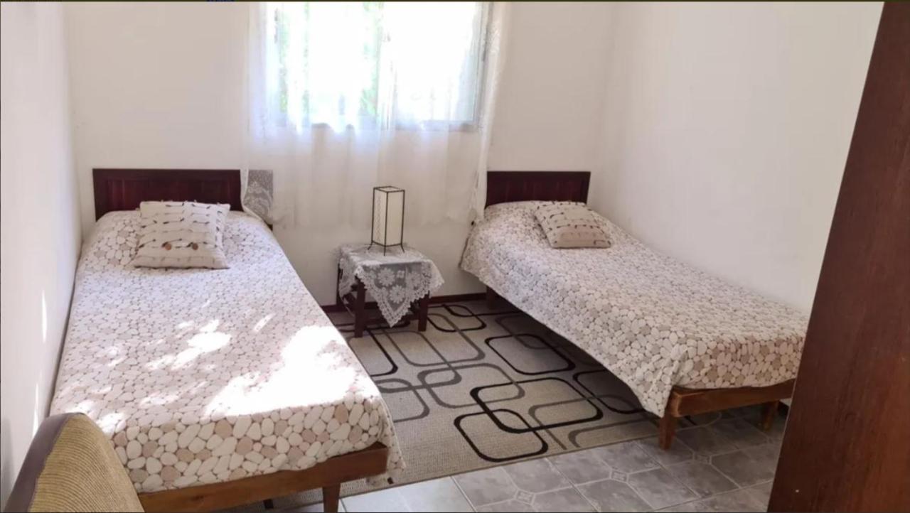 Preciosa casa en la tranquilidad de Colonia Relájate con toda la familia donde la tranquilidad se respira - A una cuadra de la mejor zona de la rambla de Colonia del Sacramento te espera esta casa para pasar las vacaciones en familia - Chambres d'hôtes Colonia del Sacramento