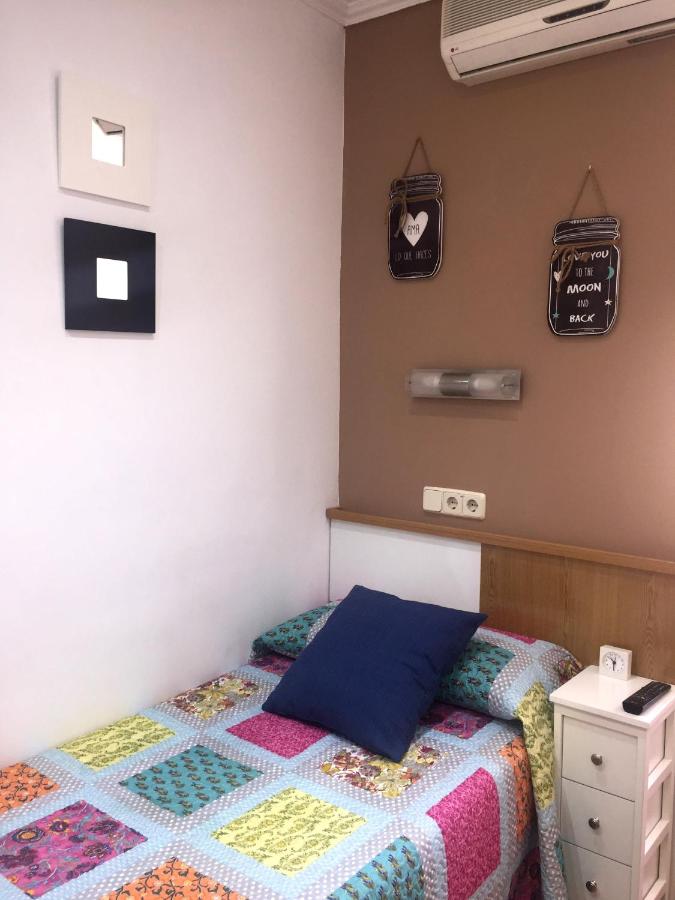 Camera Singola con Servizi Igienici in Comune