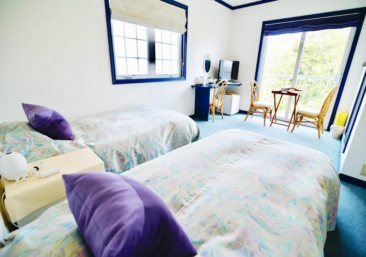 Tweepersoonskamer met 2 Aparte Bedden