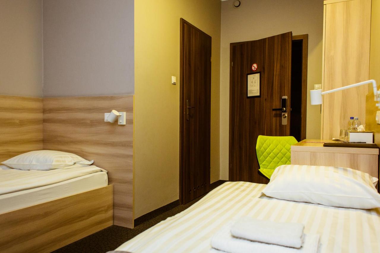 Tweepersoonskamer met 2 Aparte Bedden