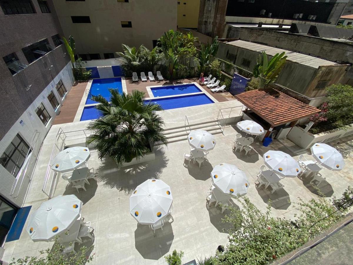 Flat em Pitangueiras - sacada gourmet, 3 dorms, limpeza diária e serv de praia - B&B