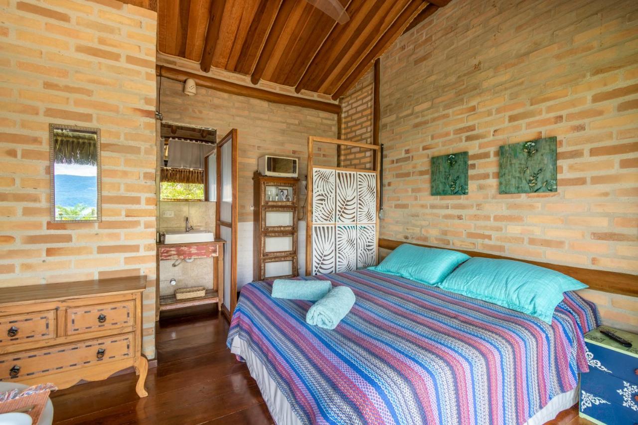 Queen Deluxe Suite with Balcony and Sea View