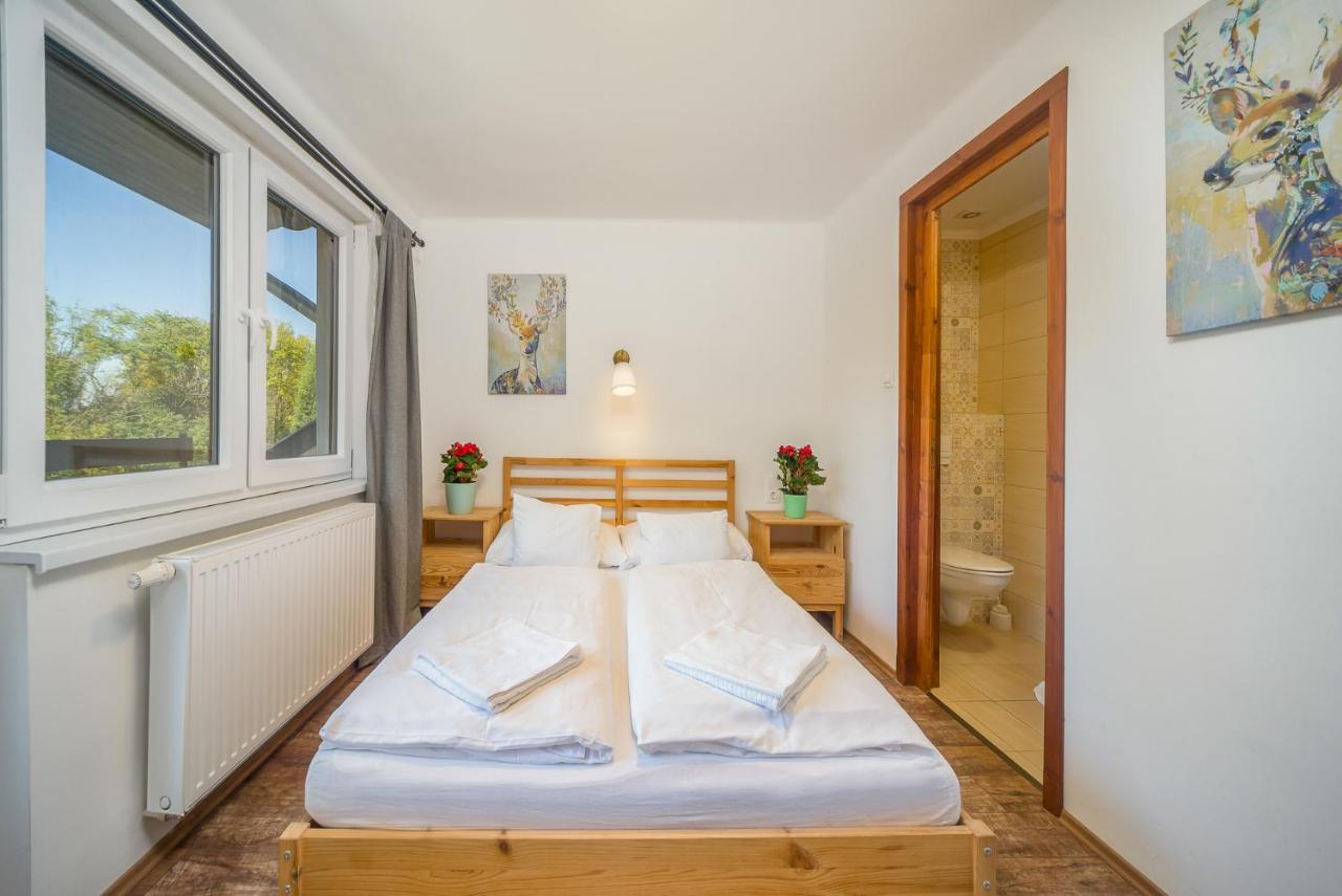 Kamer met Queensize Bed en Balkon