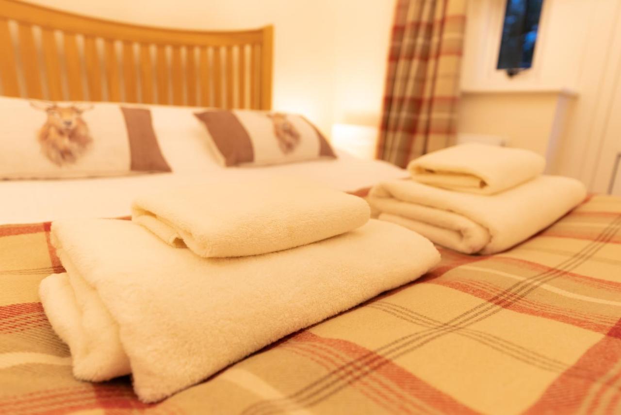 Ockham Cottages - Ferienwohnung