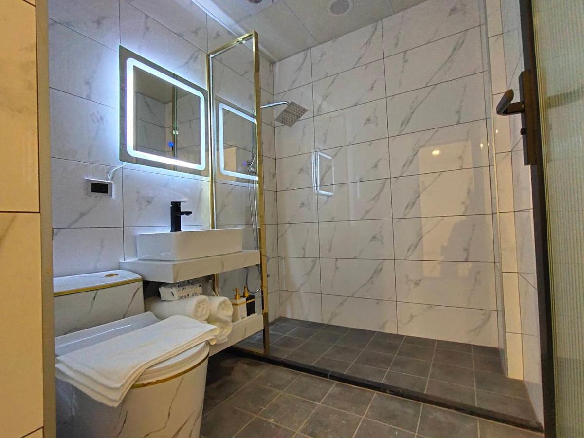 Quadruple Room with Private Bathroom