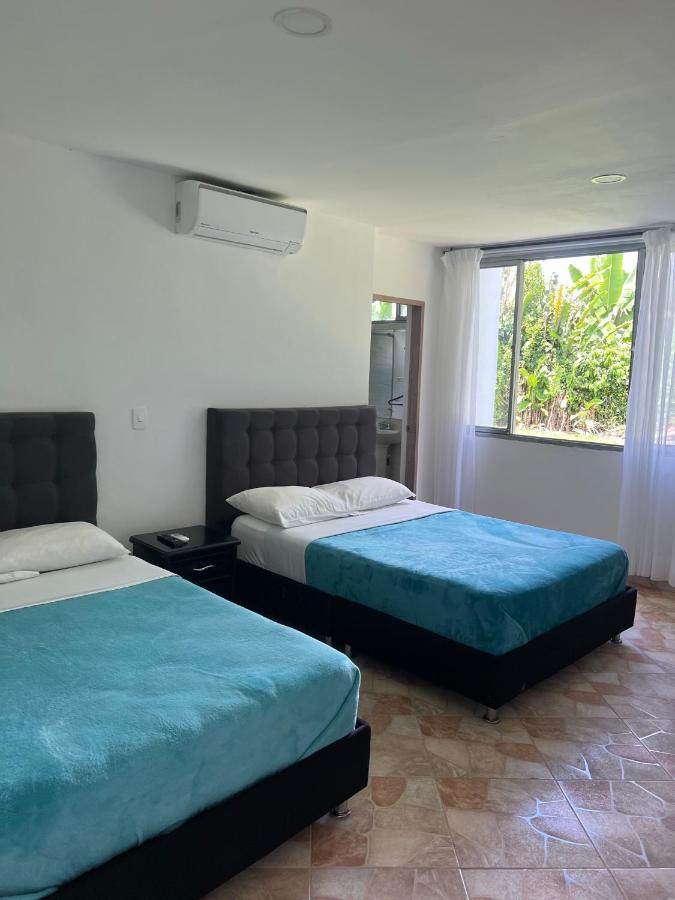 Camera Deluxe Doppia con Letti Singoli