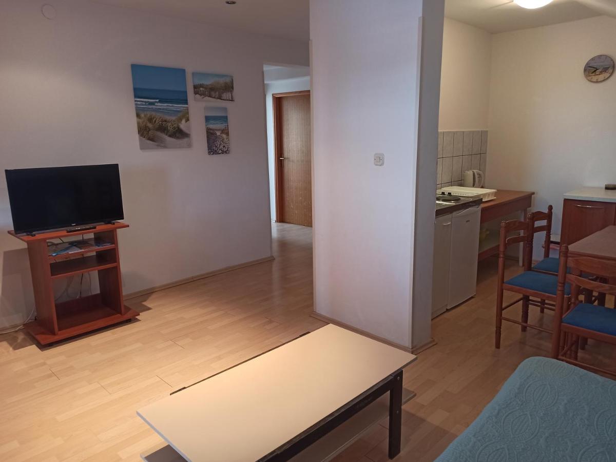 Three-Bedroom Apartment with shared Terrace
