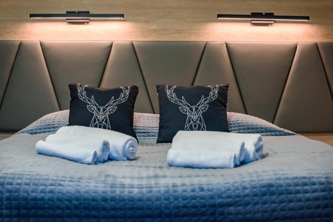 Camera Matrimoniale Deluxe (2 Adulti + 1 Bambino) 