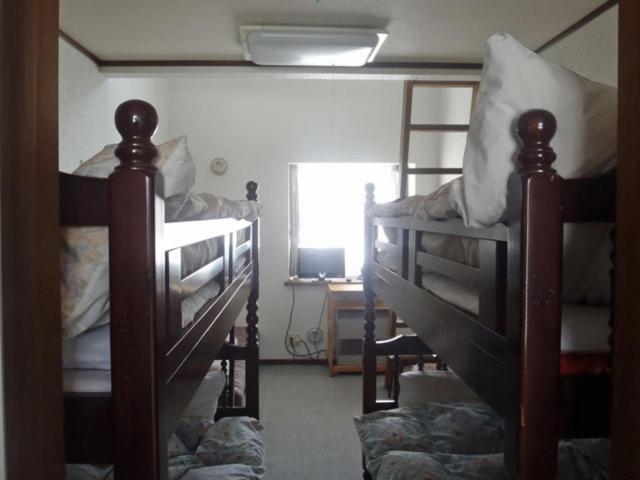 Single Bed in Dormitory Room