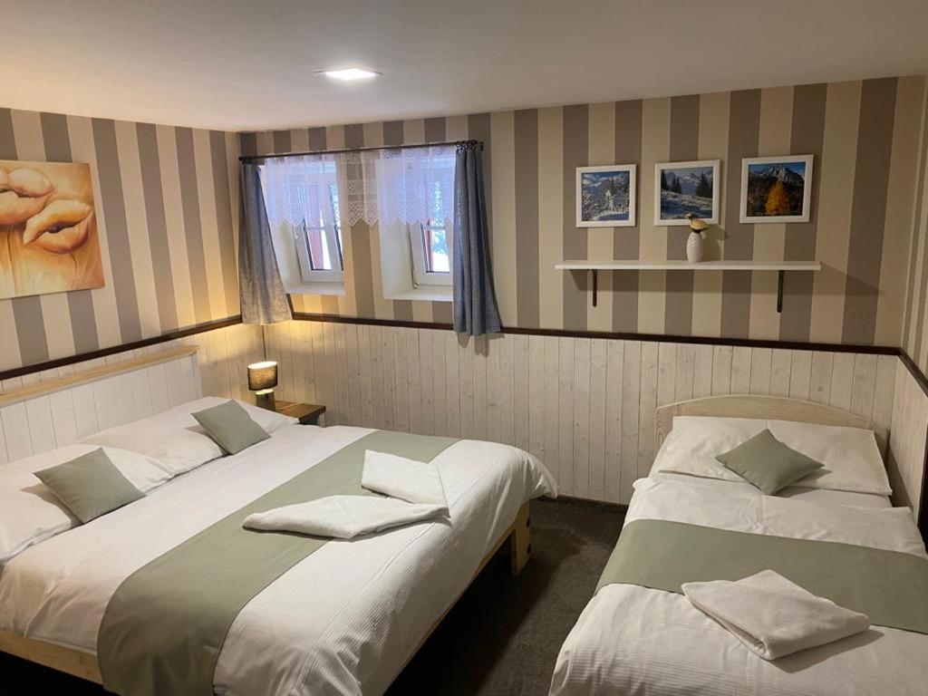 Dreibettzimmer