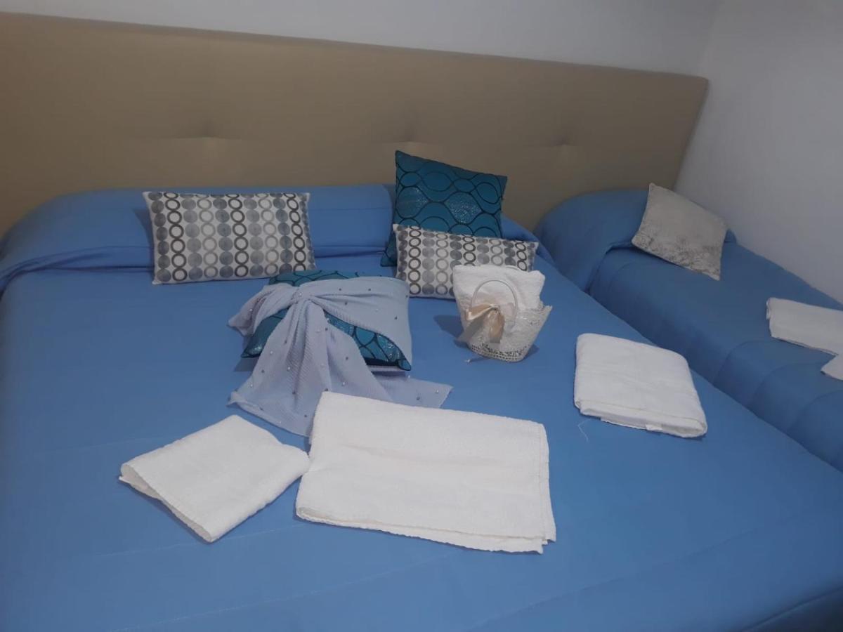 Habitación Triple con vistas al jardín