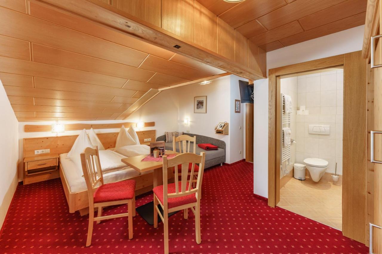 Dreibettzimmer mit Balkon