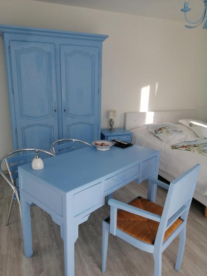 Chambre Triple avec Terrasse
