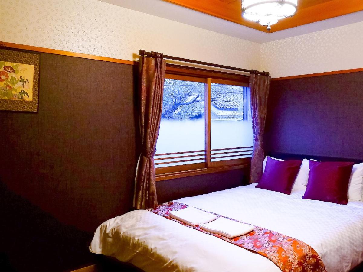 Tweepersoonskamer met Gedeelde Badkamer