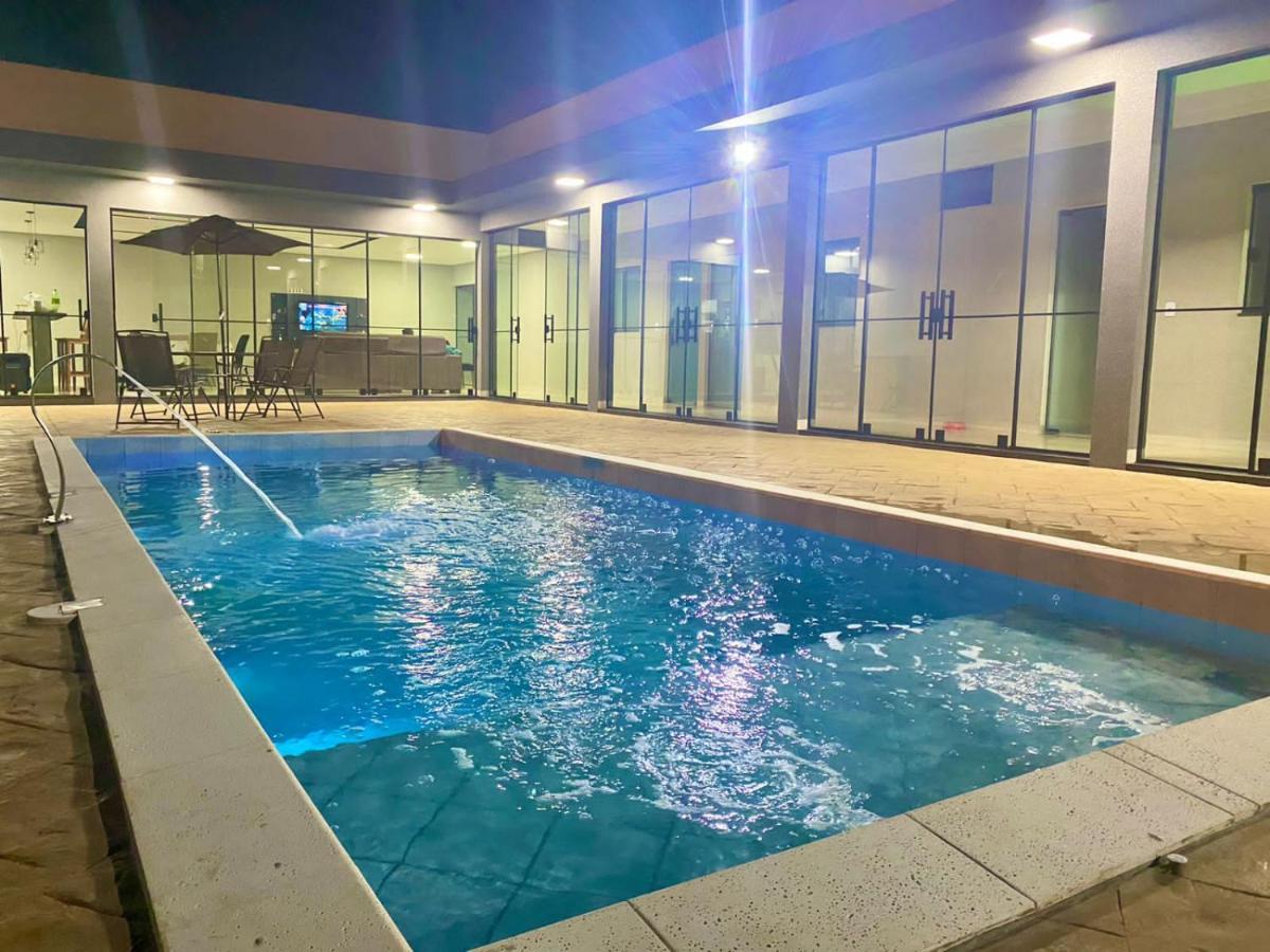 Casa Temporada Paris Thermas dos Laranjais3-Suites - Chambres d’hôtes Olímpia