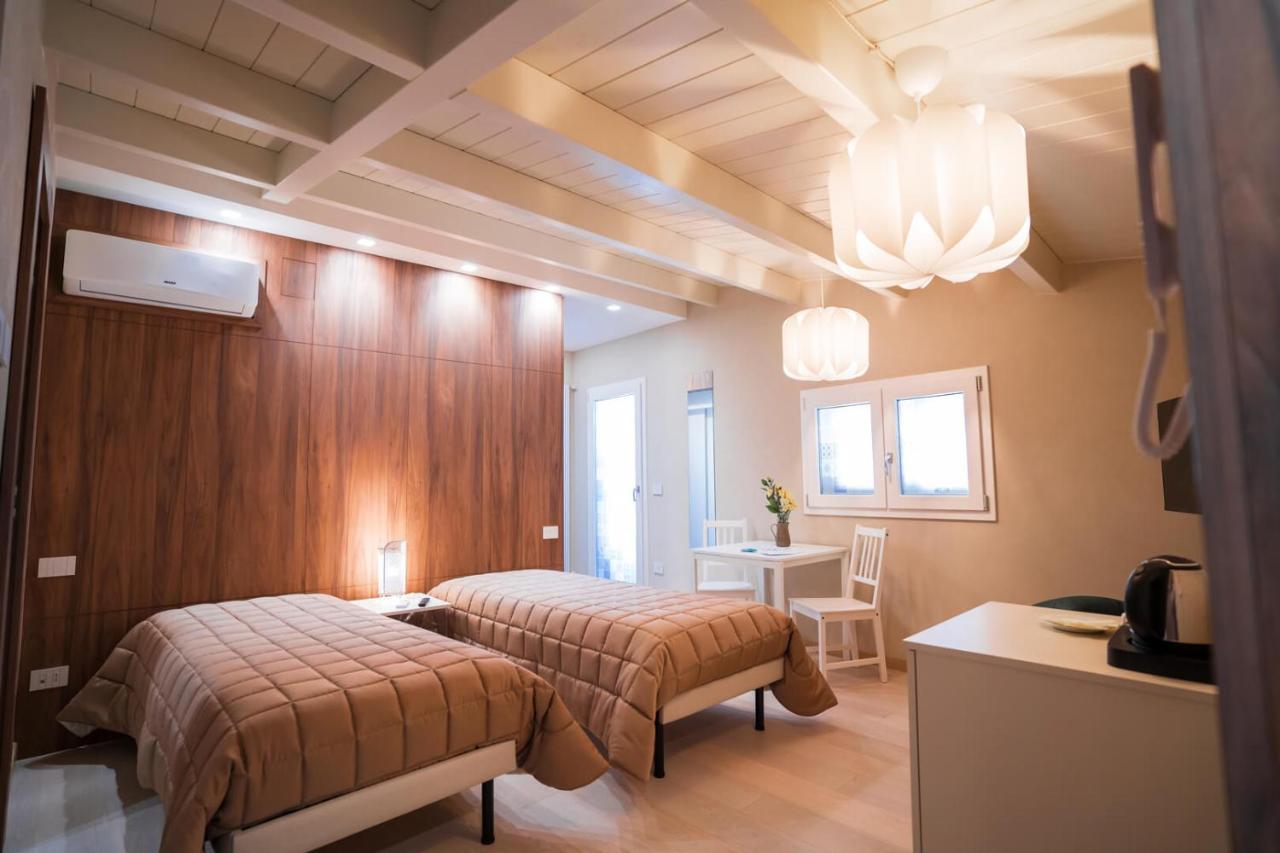 Chambre Triple avec Terrasse