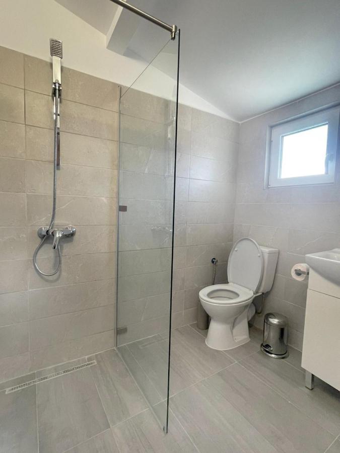 Camera Tripla con Vista Giardino