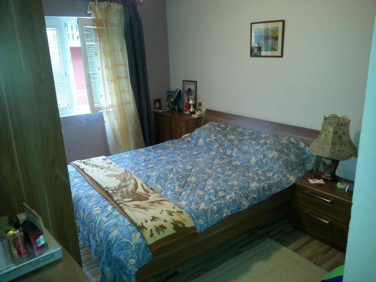 Four-Bedroom Apartment with Balcony 