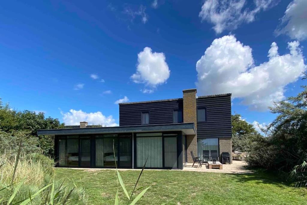 Luxe 8 persoons ‘Golfvillatexel’ vlakbij zee - B&B