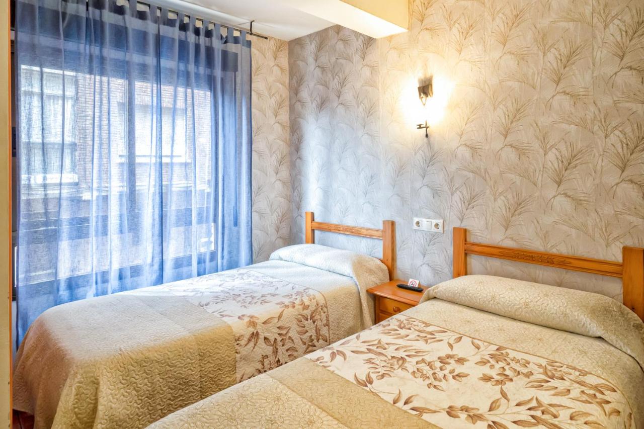 Tweepersoonskamer met 2 Aparte Bedden