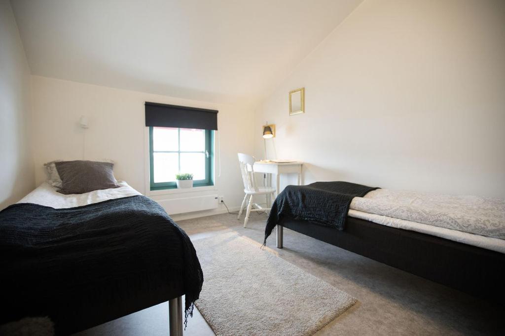 Kleine Tweepersoonskamer met 2 Aparte Bedden
