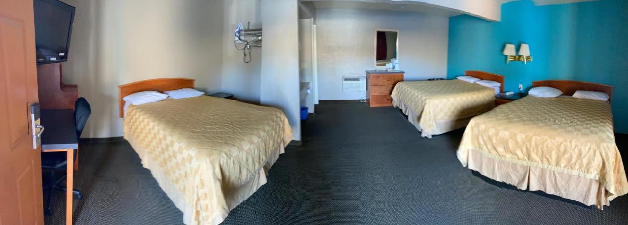 Kamer met 3 Queensize Bedden