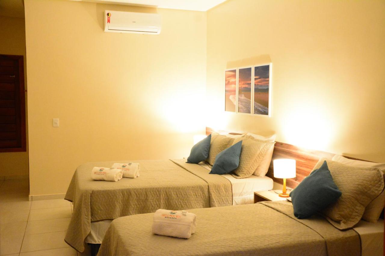 Dreibettzimmer mit Poolblick